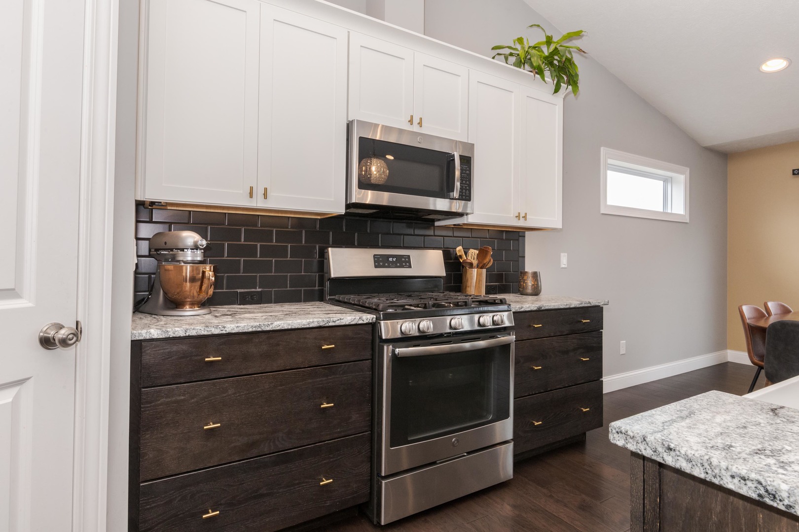 2608 Shale Road Normal, IL 61761 - Photo 17 of 39 a kitchen with a stove and a microwave