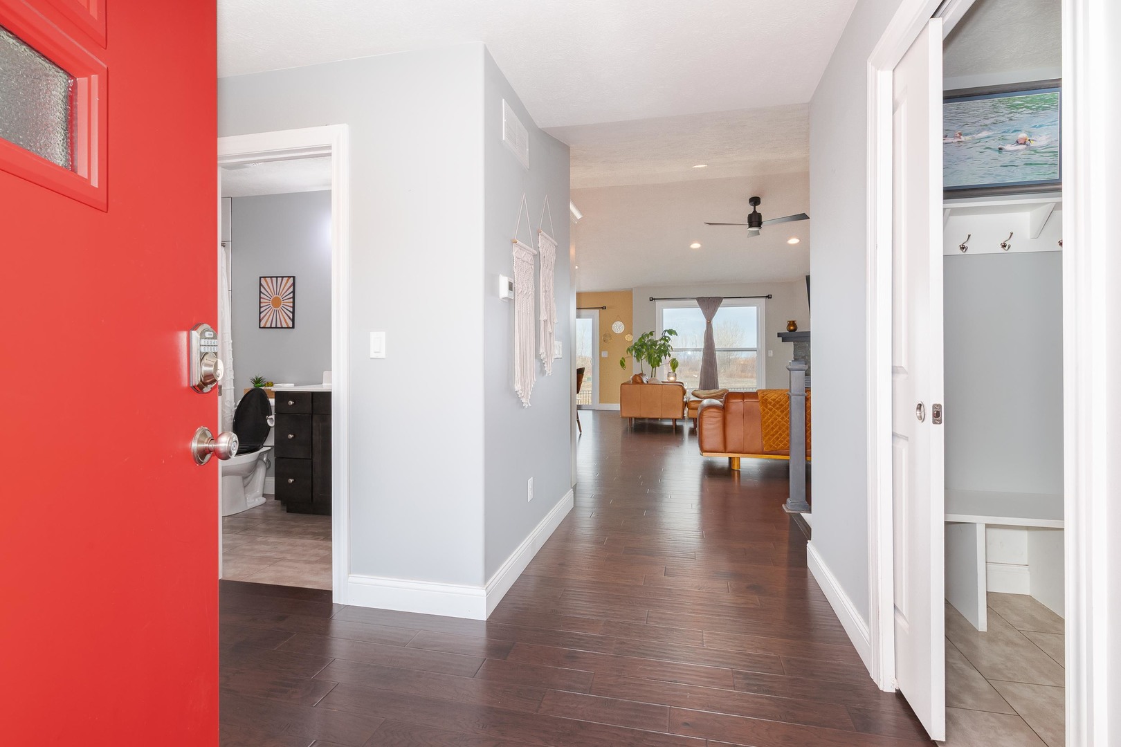 2608 Shale Road Normal, IL 61761 - Photo 3 of 39 a view of a hallway with wooden floor windows and a livingroom