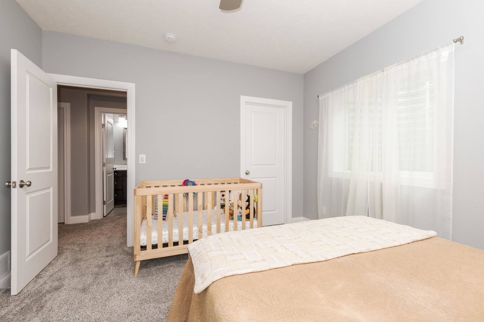 2608 Shale Road Normal, IL 61761 - Photo 33 of 39 a bedroom with a bed and a white cabinet
