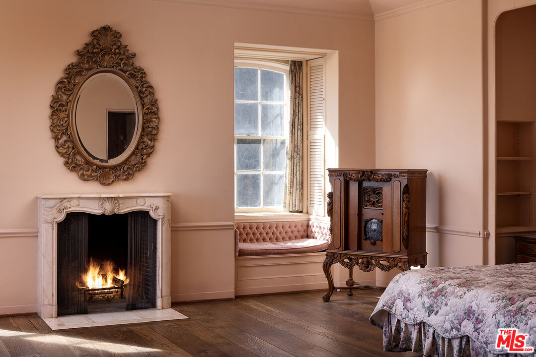 7141 Senalda Road Los Angeles, CA 90068 - Photo 14 of 26 a living room with furniture and a fireplace
