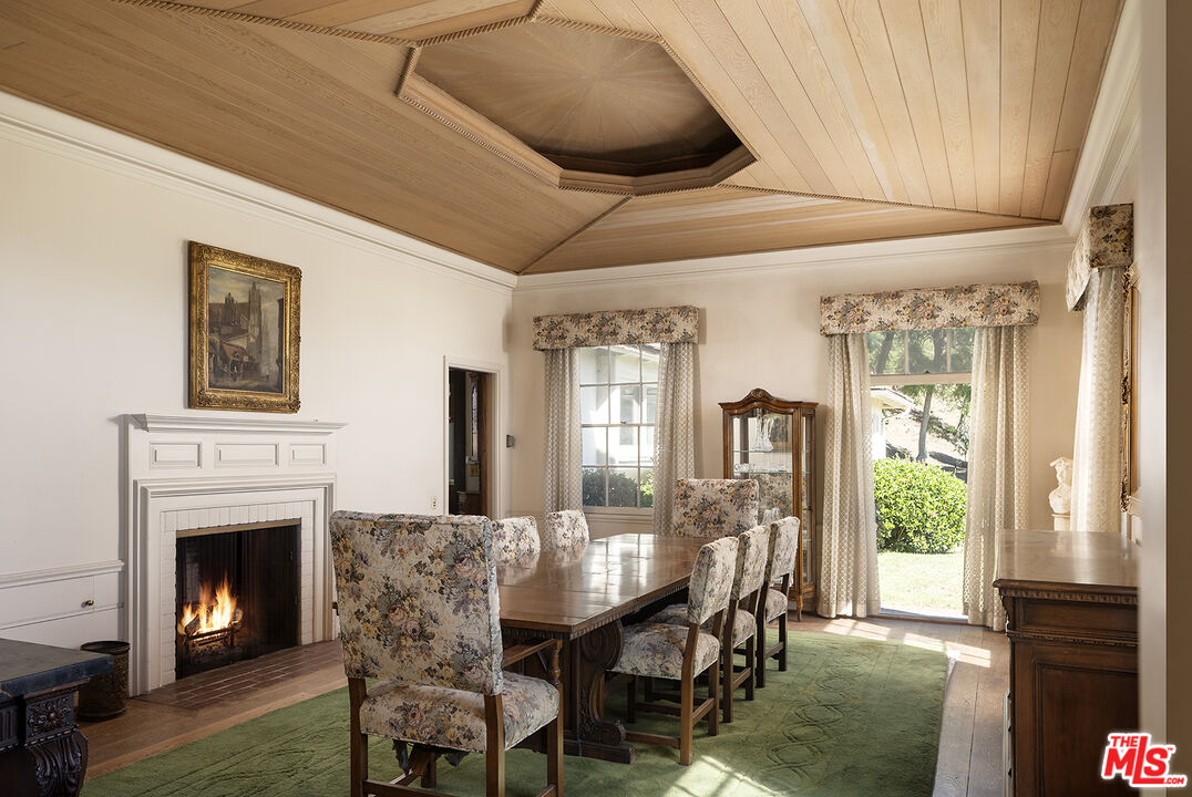 7141 Senalda Road Los Angeles, CA 90068 - Photo 10 of 26 a view of a dining room with furniture window and wooden floor