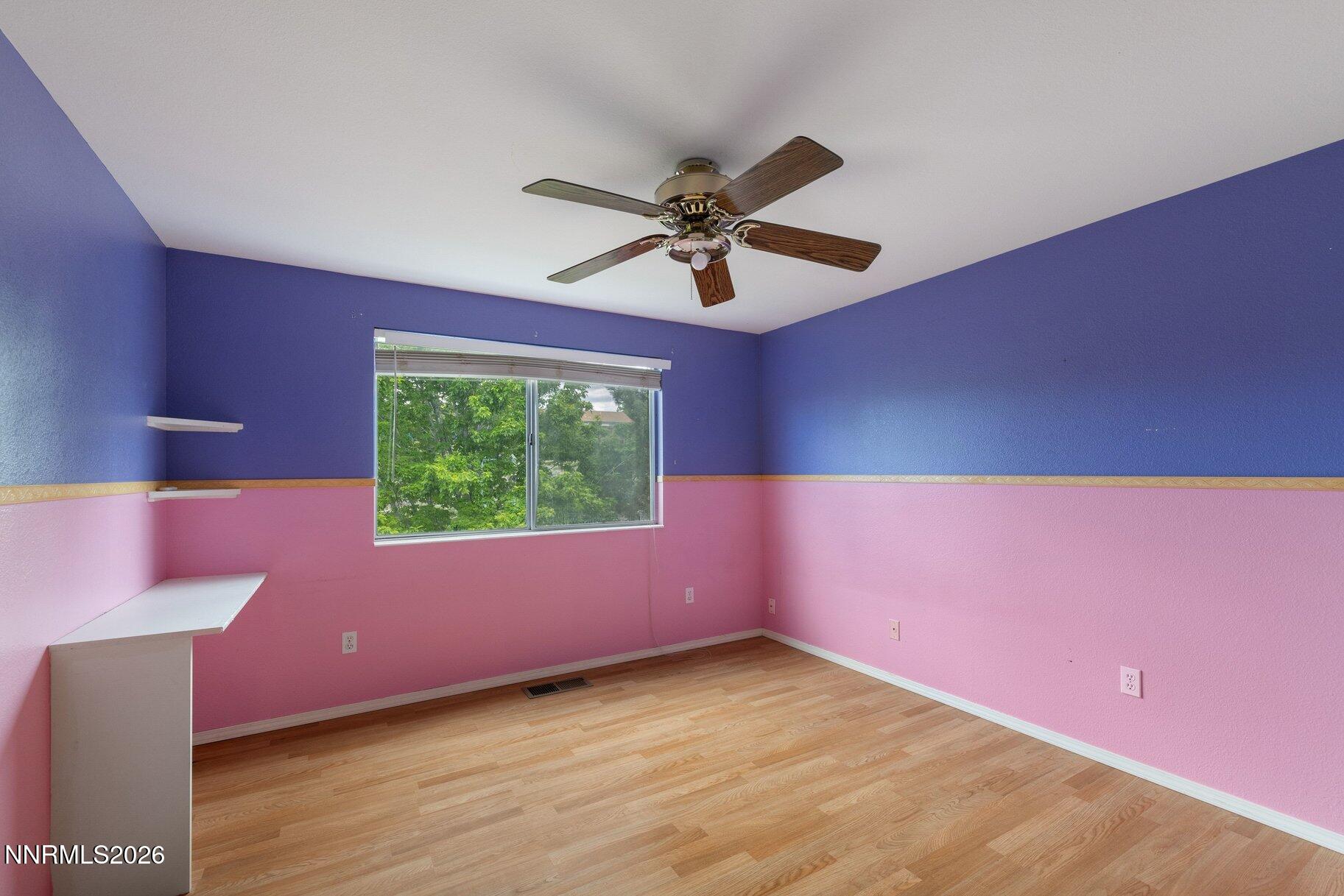 8486 Piper Place Reno, NV 89506 - Photo 24 of 80 a view of an empty room with a window