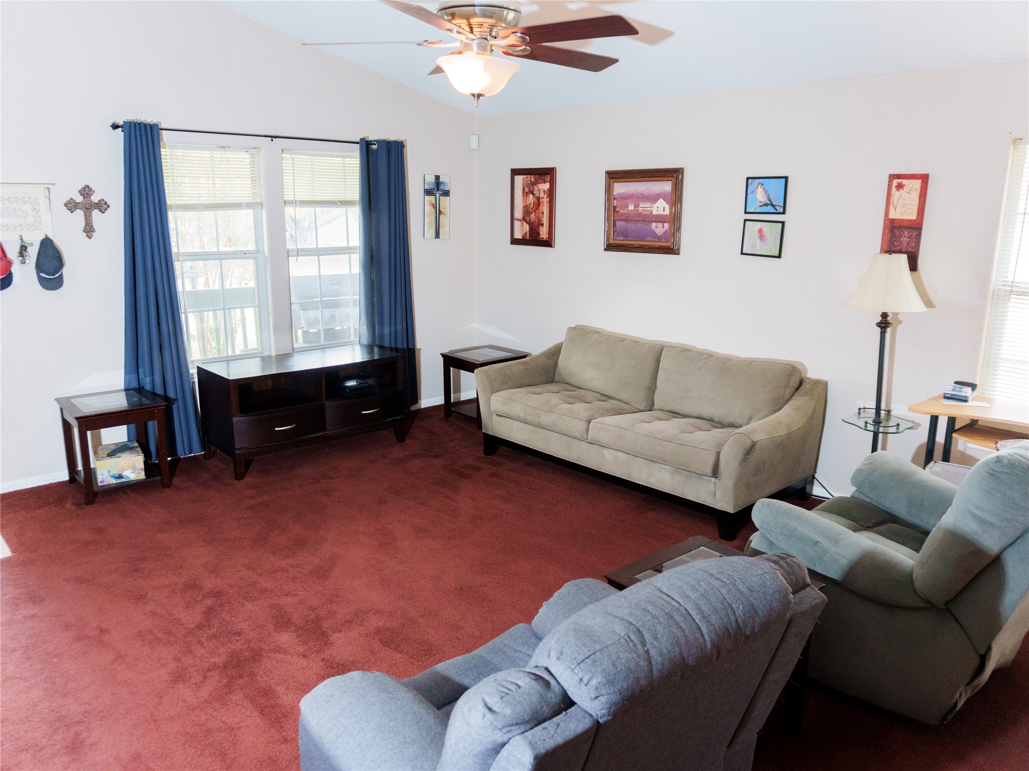 800 Debra Drive Taylor, TX 76574 - Photo 5 of 17 Living area with carpet flooring and ceiling fan