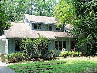 6817 Branton Cary, NC 27519 - Photo 1 of 1 a view of house with a yard and potted plants