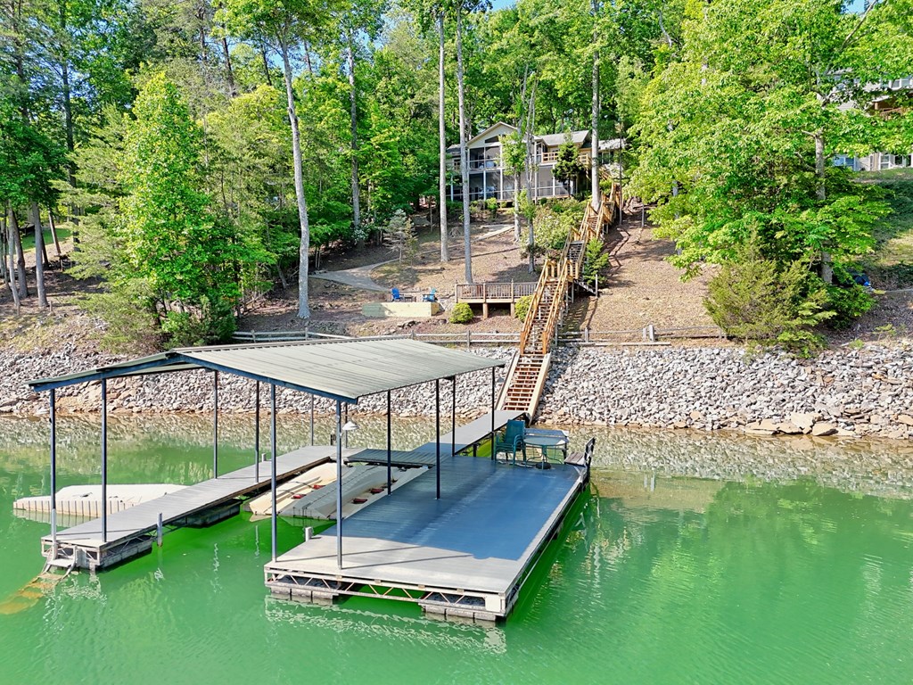 456 Deaver Cove Road Blairsville, GA 30512 - Photo 32 of 83 a garden view with a sitting space