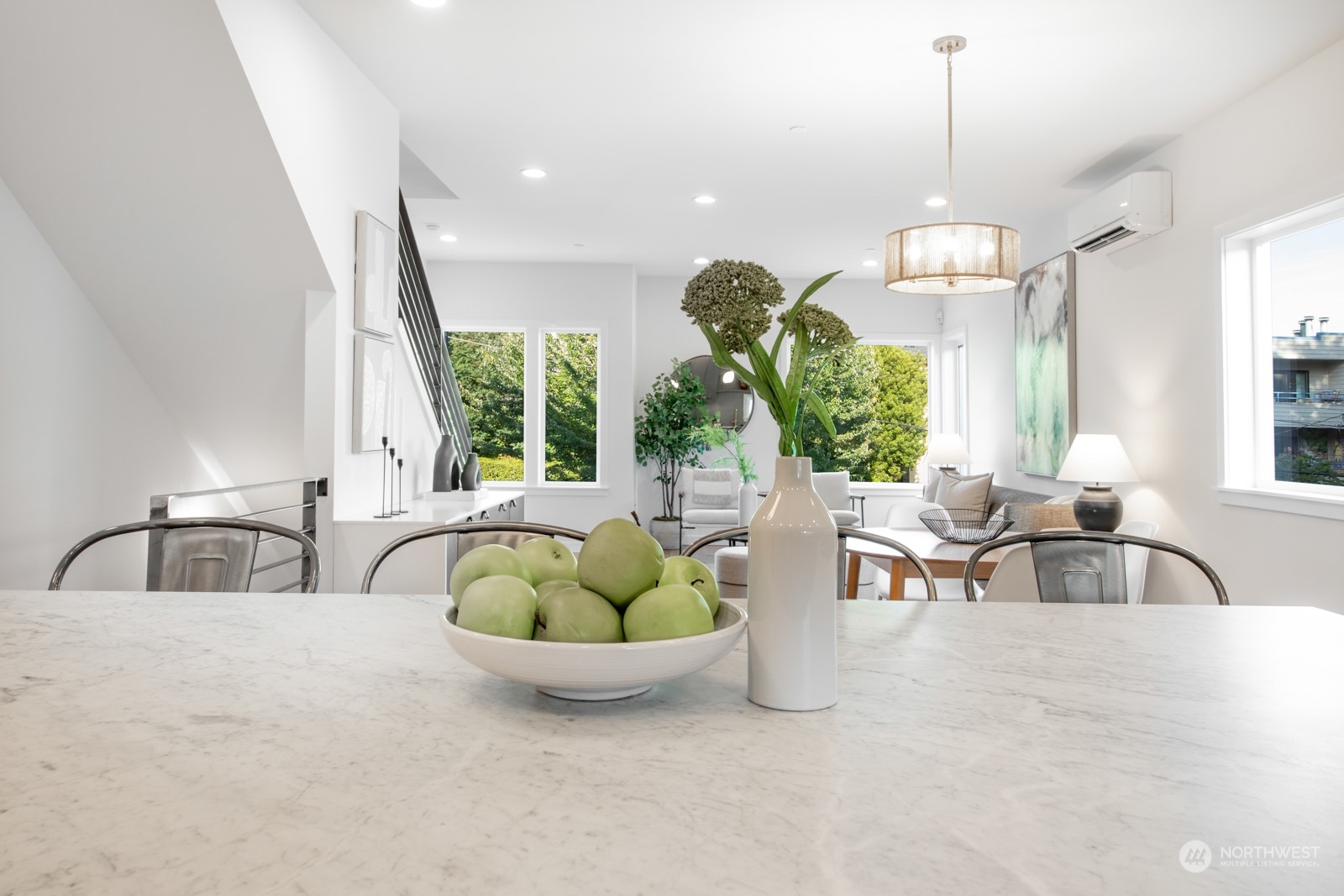 3649 Francis Avenue North, Unit A Seattle, WA 98103 - Photo 12 of 35 a living room with furniture potted plant and a large window