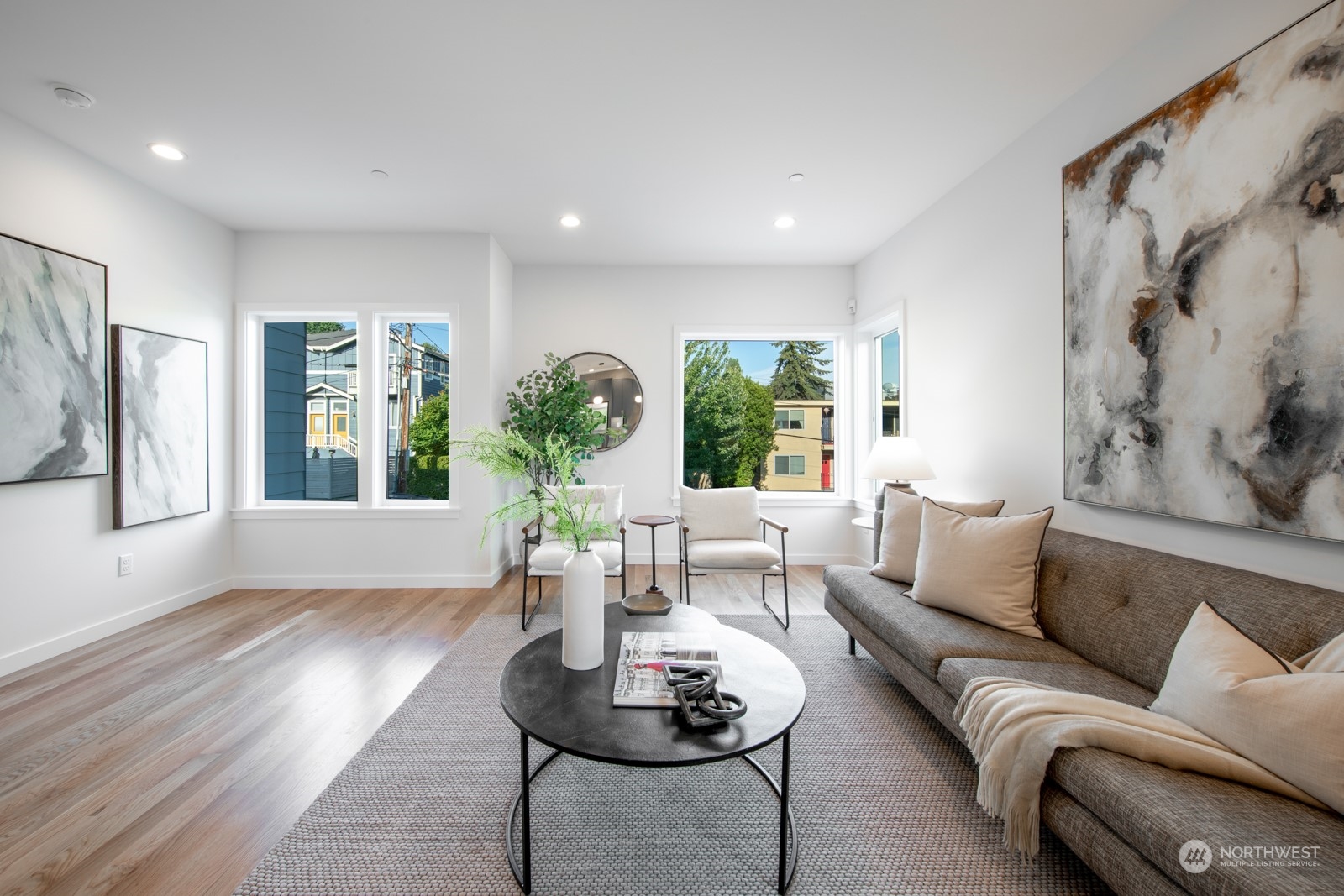 3649 Francis Avenue North, Unit A Seattle, WA 98103 - Photo 16 of 35 a living room with furniture and a large window