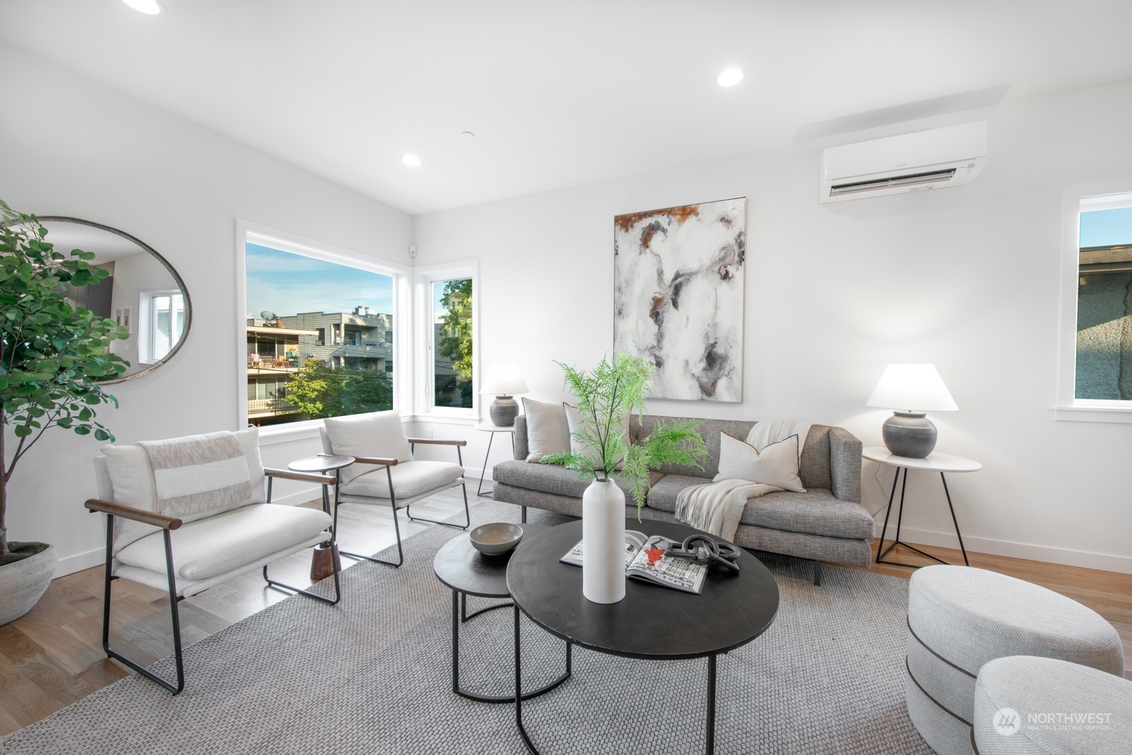3649 Francis Avenue North, Unit A Seattle, WA 98103 - Photo 17 of 35 a living room with furniture and a large window