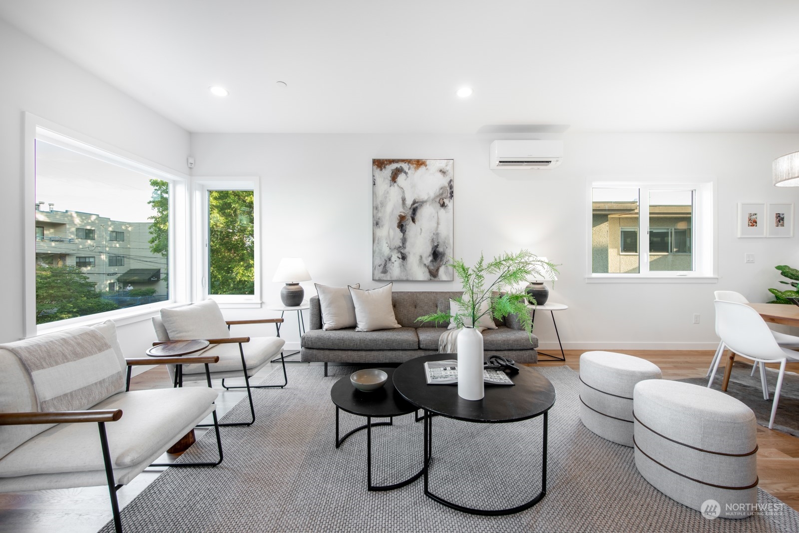 3649 Francis Avenue North, Unit A Seattle, WA 98103 - Photo 18 of 35 a living room with furniture and a large window