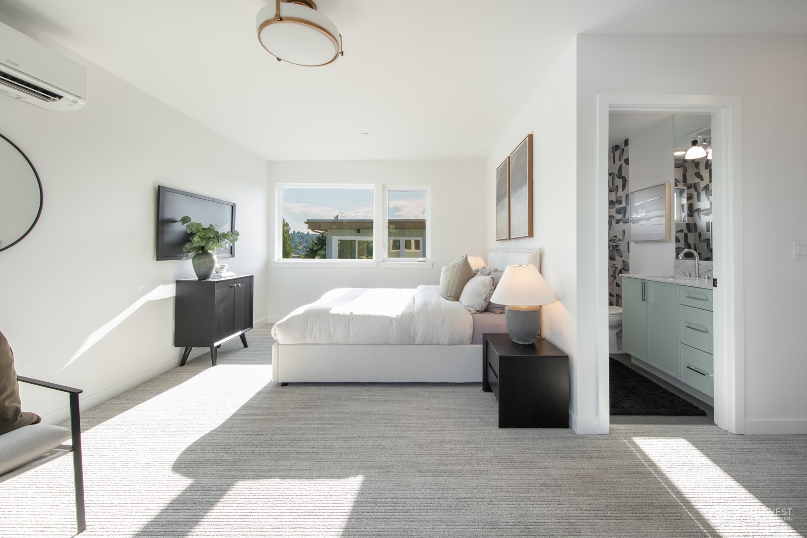3649 Francis Avenue North, Unit A Seattle, WA 98103 - Photo 28 of 35 a living room with furniture windows and a chandelier