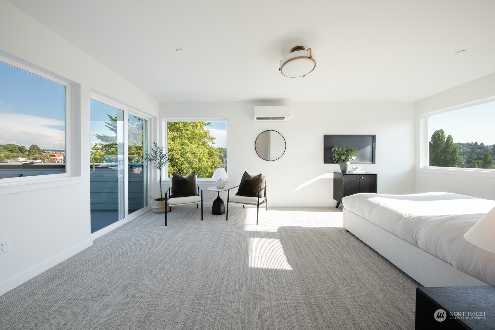 3649 Francis Avenue North, Unit A Seattle, WA 98103 - Photo 29 of 35 a living room with furniture and a large window