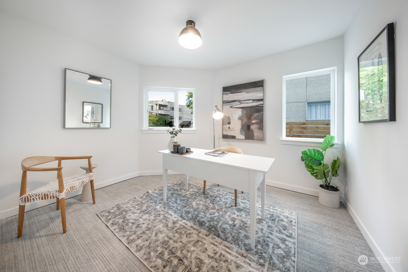 3649 Francis Avenue North, Unit A Seattle, WA 98103 - Photo 4 of 35 a room with a table and chair