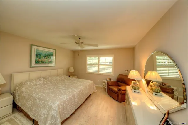 a view of walk in closet with clothes