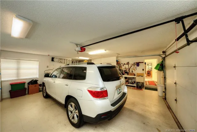 a living room with furniture gym equipment and a view of living room