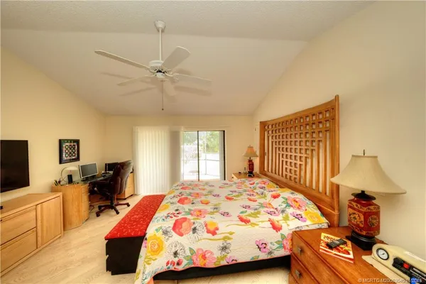 a view of a dining room a table and chairs