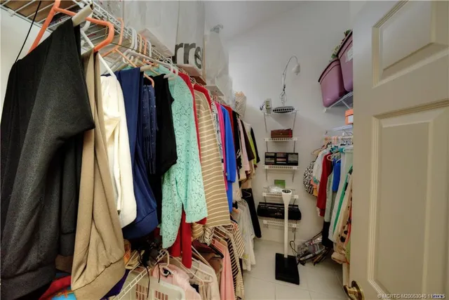 a view of a backyard with sitting area