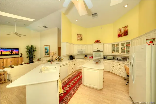 a picture of a room with table and chairs