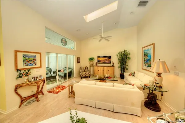 a view of a big yard with a large tree