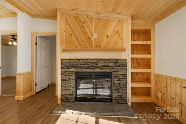 a living room with a fireplace