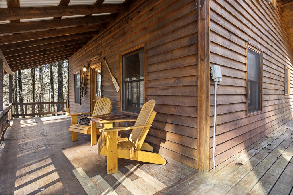 104 Big Tree Road Suches, GA 30572 - Photo 9 of 19 a building outdoor space with wooden benches