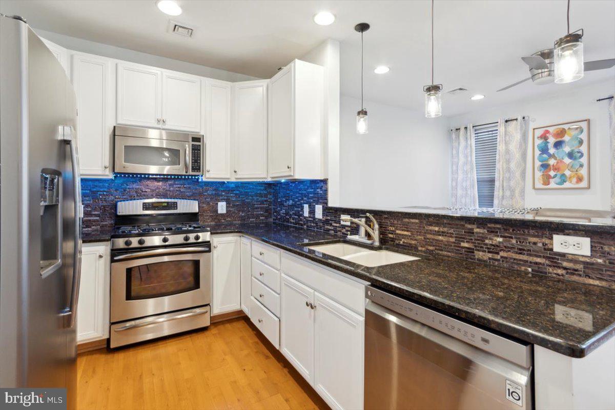 3152 Master Street, Unit 58 Philadelphia, PA 19121 - Photo 3 of 21 Kitchen w. stainless steel appliances.