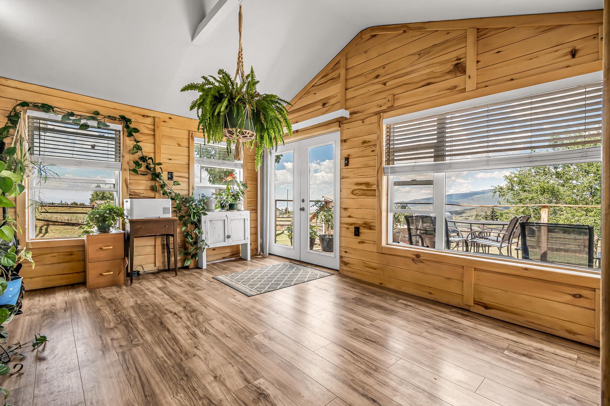 24413 Ute Trail Road Cedaredge, CO 81413 - Photo 12 of 40 a view of a balcony with lake view and the floor