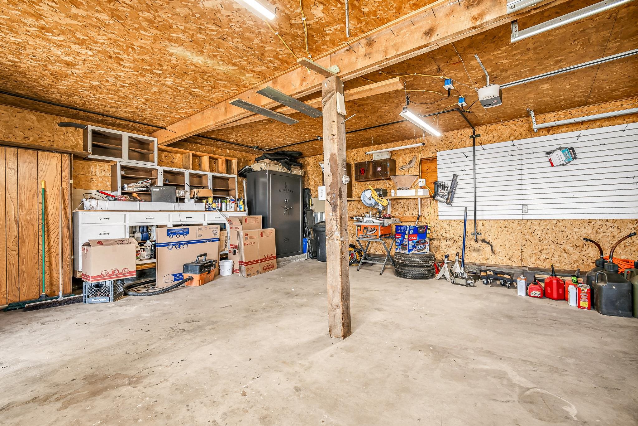 24413 Ute Trail Road Cedaredge, CO 81413 - Photo 35 of 40 a view of a garage with parked cars
