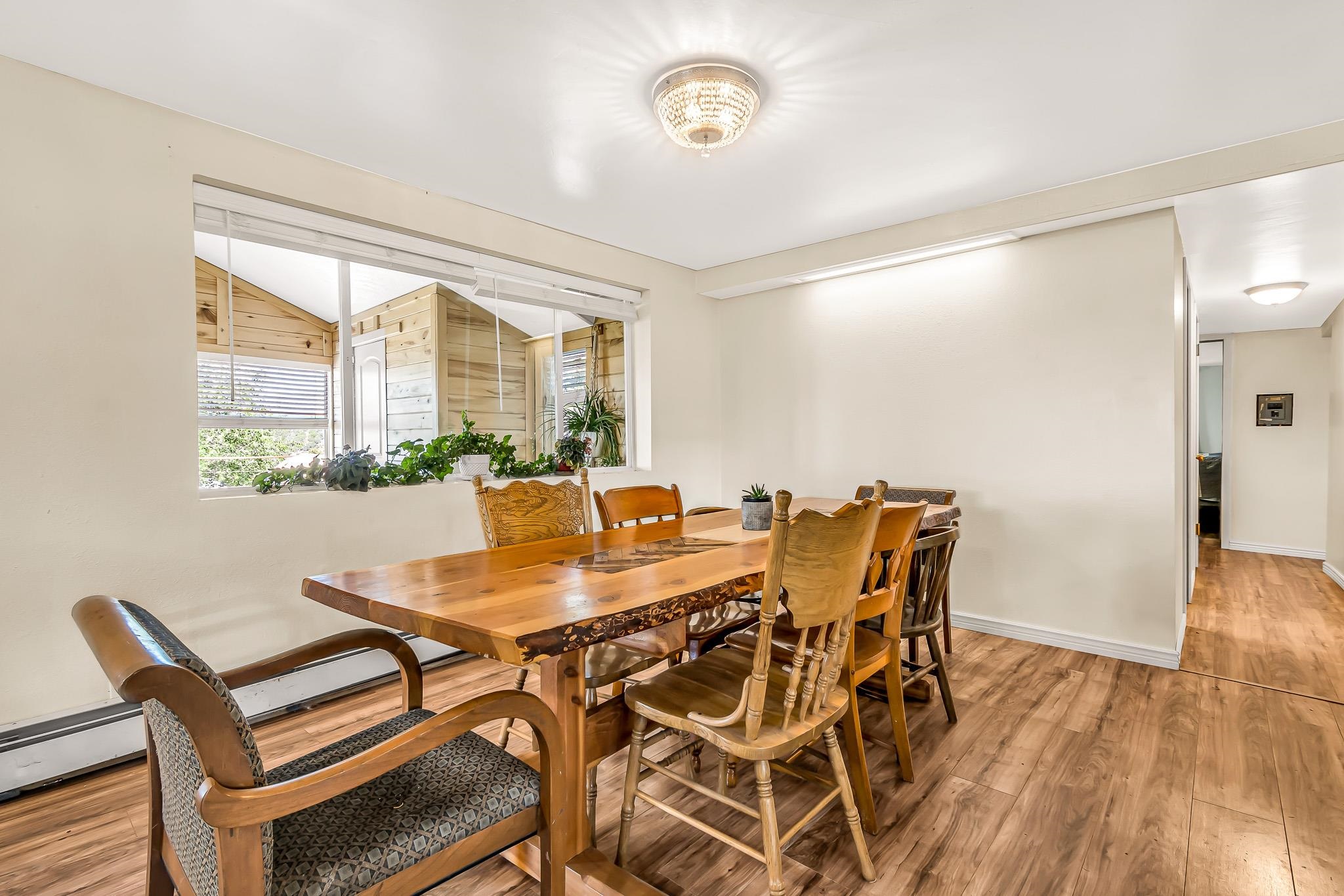 24413 Ute Trail Road Cedaredge, CO 81413 - Photo 10 of 40 a view of a dining room with furniture window and outside view