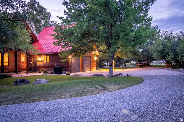 435 Canyon Road Millville, UT 84326 - Photo 93 of 113 Rustic-style residence featuring a red metal roof and wood siding