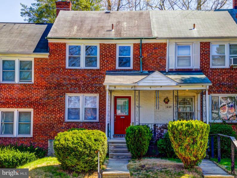 1027 Witherspoon Road Baltimore, MD 21212 - Photo 2 of 21 a front view of a house with garden