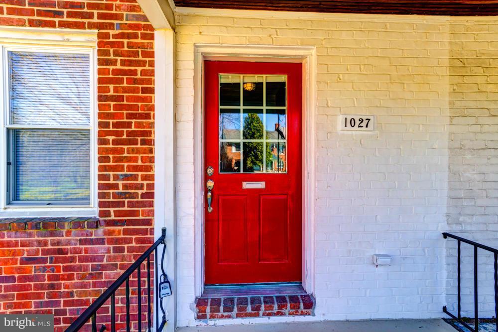 1027 Witherspoon Road Baltimore, MD 21212 - Photo 20 of 21 a view of a red door of the house