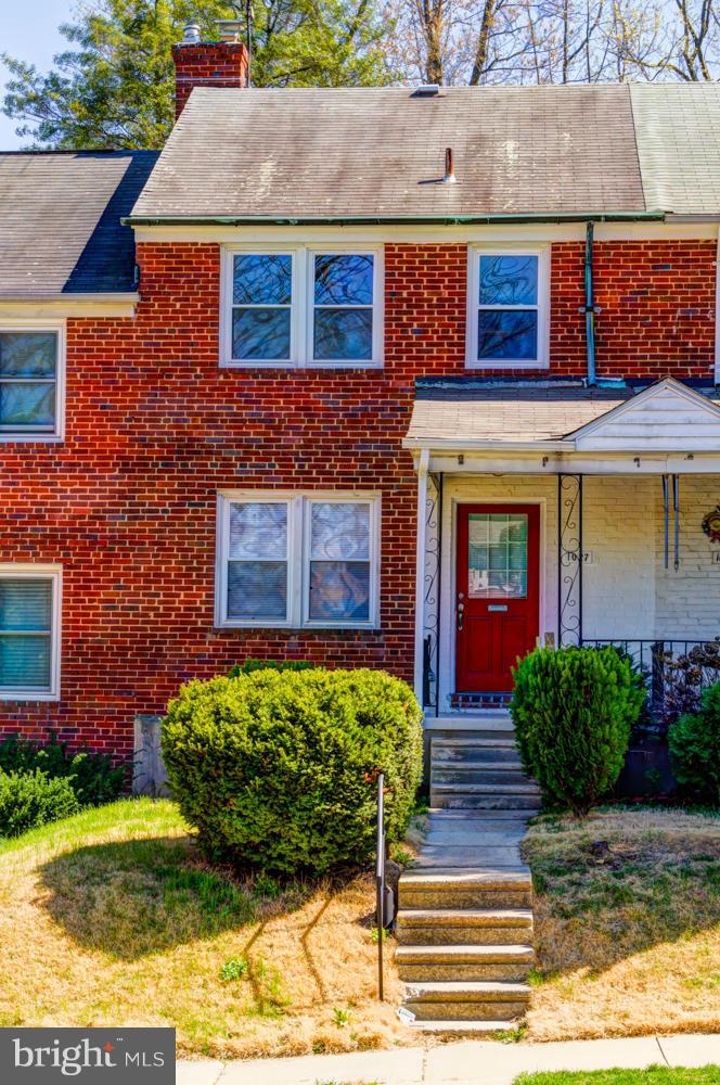1027 Witherspoon Road Baltimore, MD 21212 - Photo 21 of 21 a front view of a house with garden
