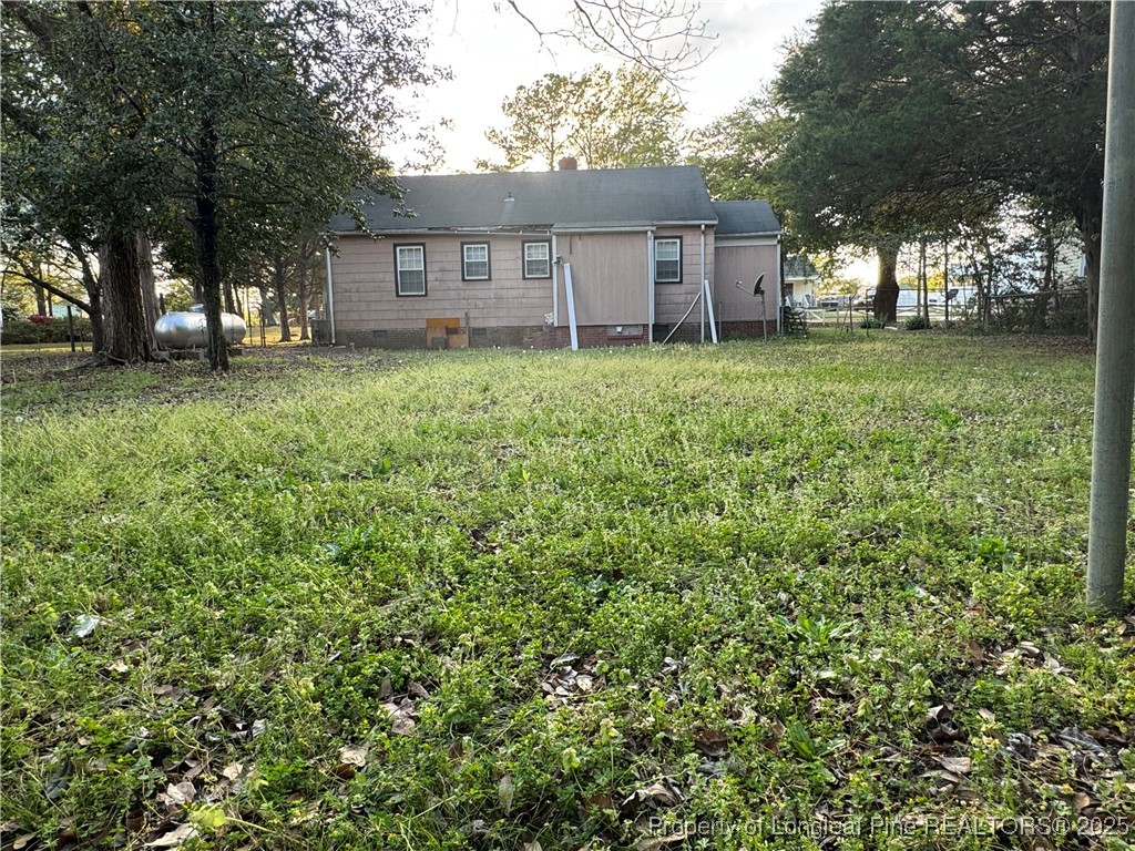 116 North Wright Street Raeford, NC 28376 - Photo 12 of 13 front view of a house with a yard