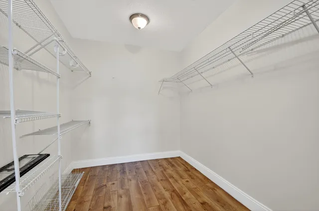 a view of a room with racks on the wall