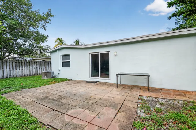 a house with yard in front of it