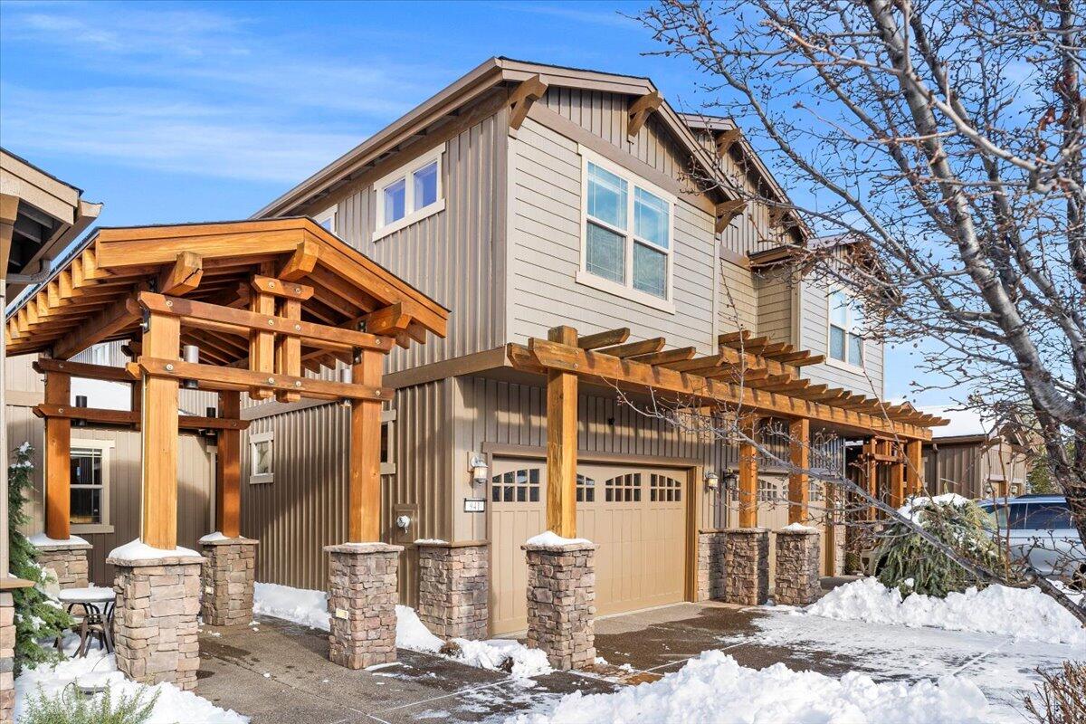 941 Southwest Vantage Point Way Bend, OR 97702 - Photo 2 of 52 Discover the allure of this captivating townhome nestled on the Bluffs at River Bend in the heart of the Old Mill District.