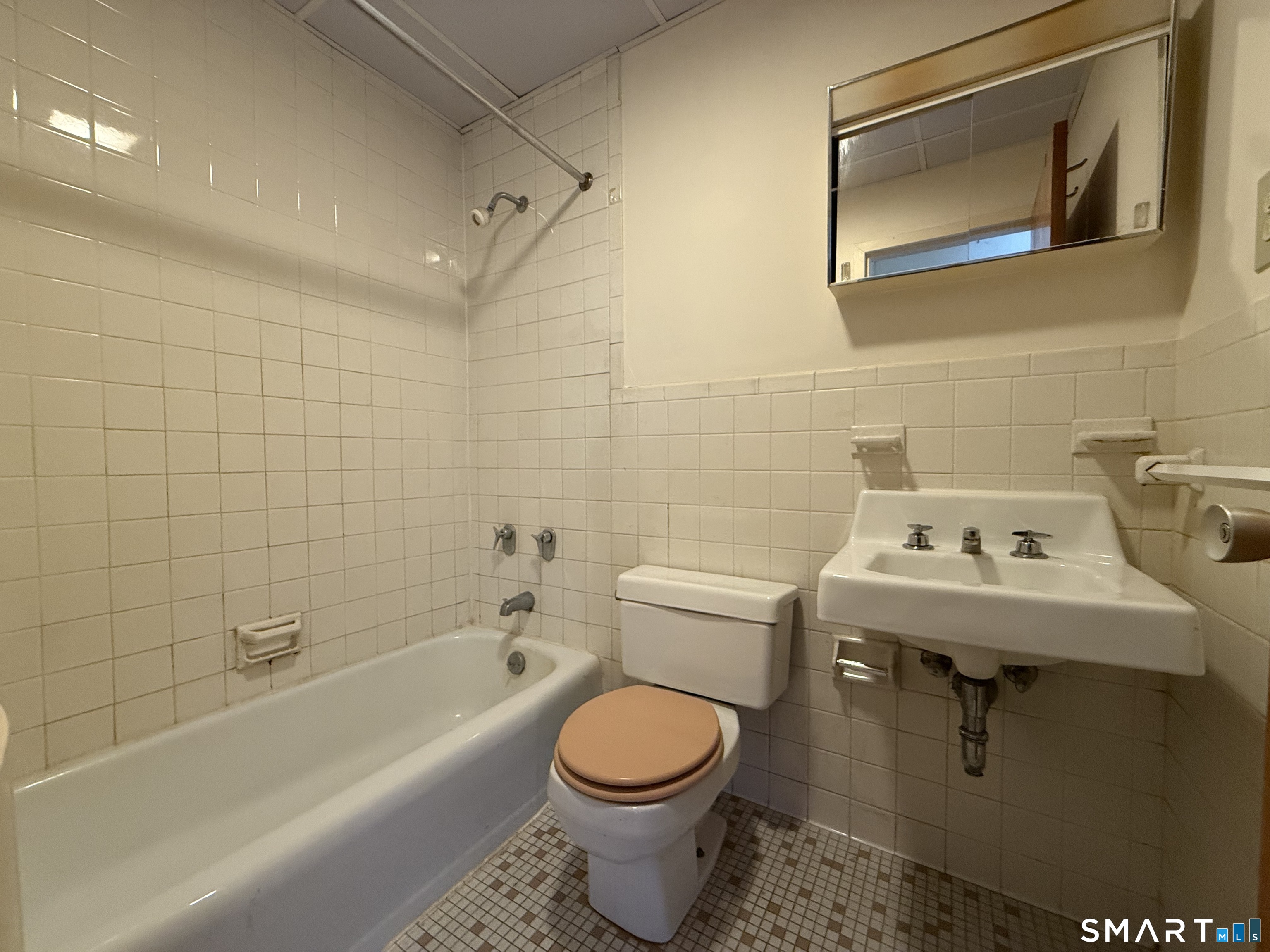 35 Beers Street, Unit 202 Bridgeport, CT 06606 - Photo 6 of 6 a bathroom with a sink toilet and bathtub