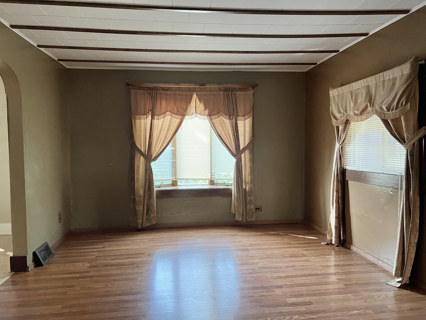 113 Wilson Avenue Chadwick, IL 61014 - Photo 8 of 19 a view of empty room with wooden floor and fan