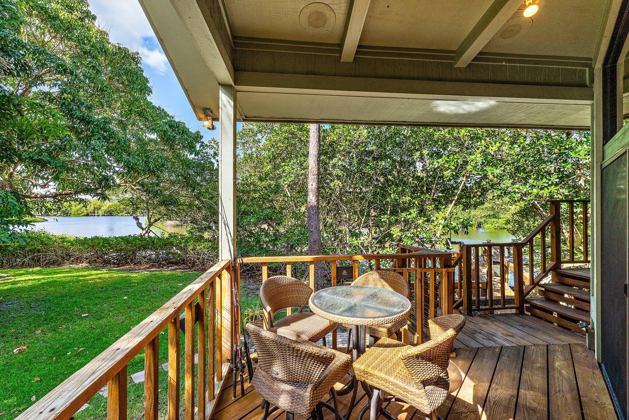 702 Warren Drive Jupiter, FL 33458 - Photo 18 of 76 a view from deck with patio