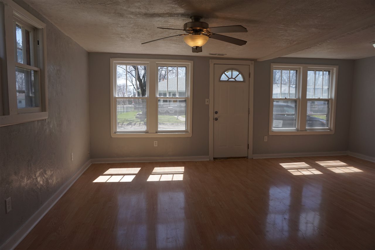 422 Fitch Road Rockford, IL 61109 - Photo 2 of 11 a view of an empty room and window