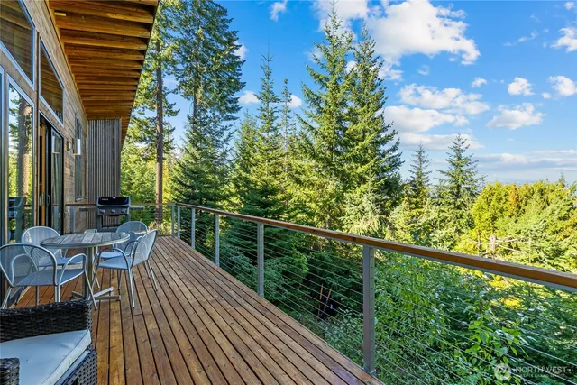 a view of balcony with furniture