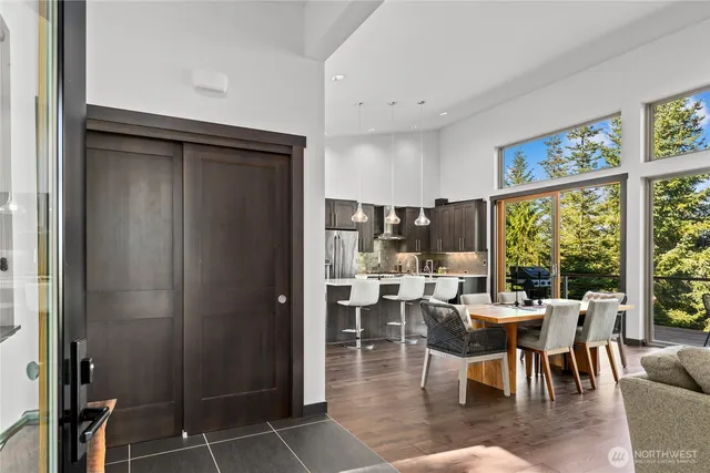 a view of a dining room with furniture window and outside view