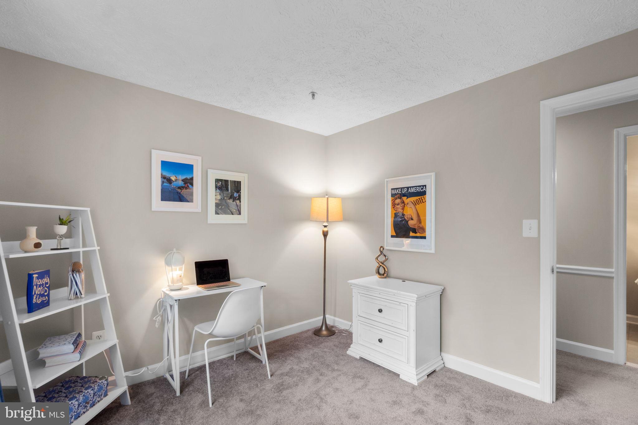 6509 Springwater Court, Unit 6303 Frederick, MD 21701 - Photo 25 of 48 a workspace with furniture and window