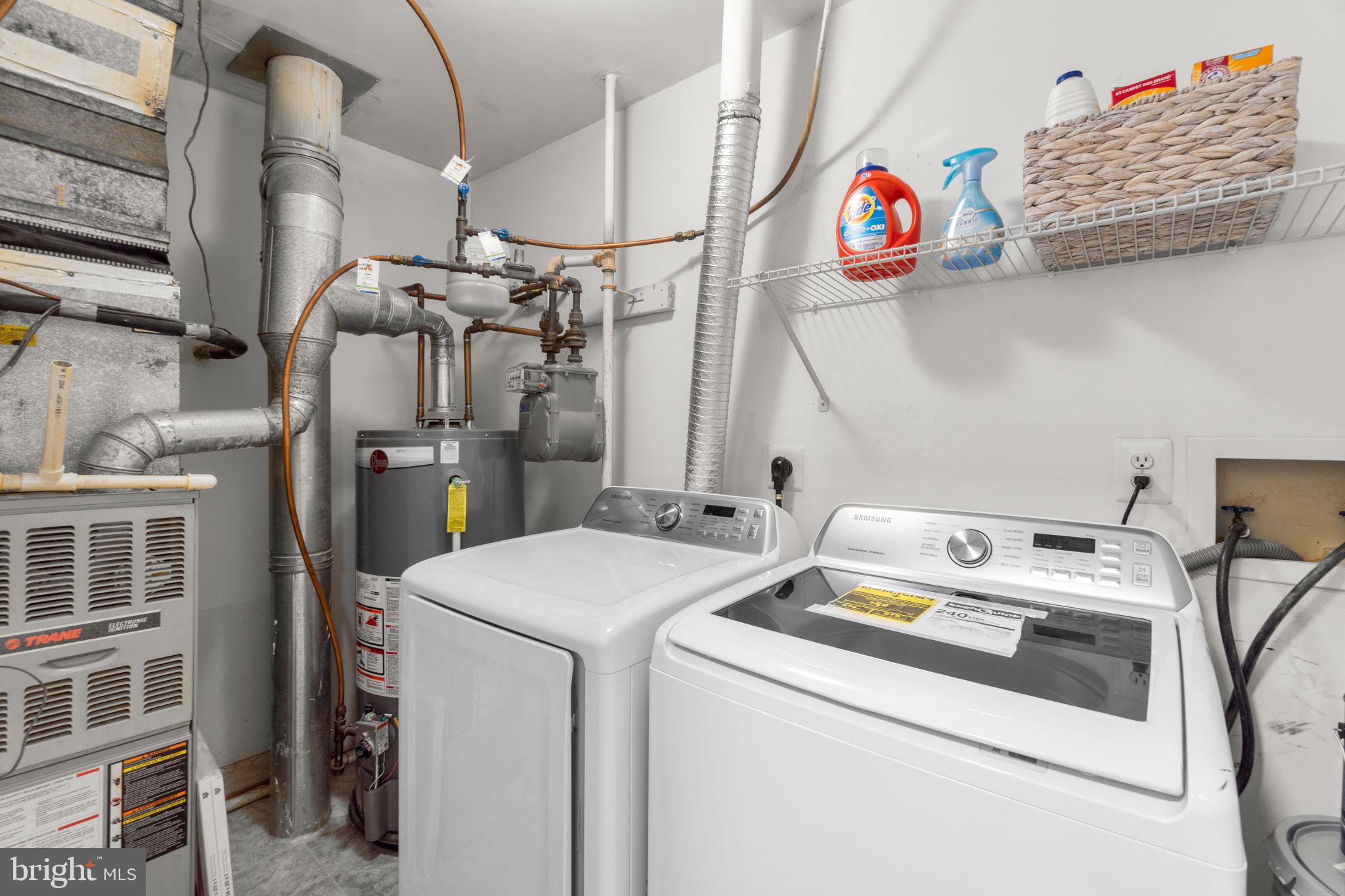 6509 Springwater Court, Unit 6303 Frederick, MD 21701 - Photo 28 of 48 a utility room with dryer and washer