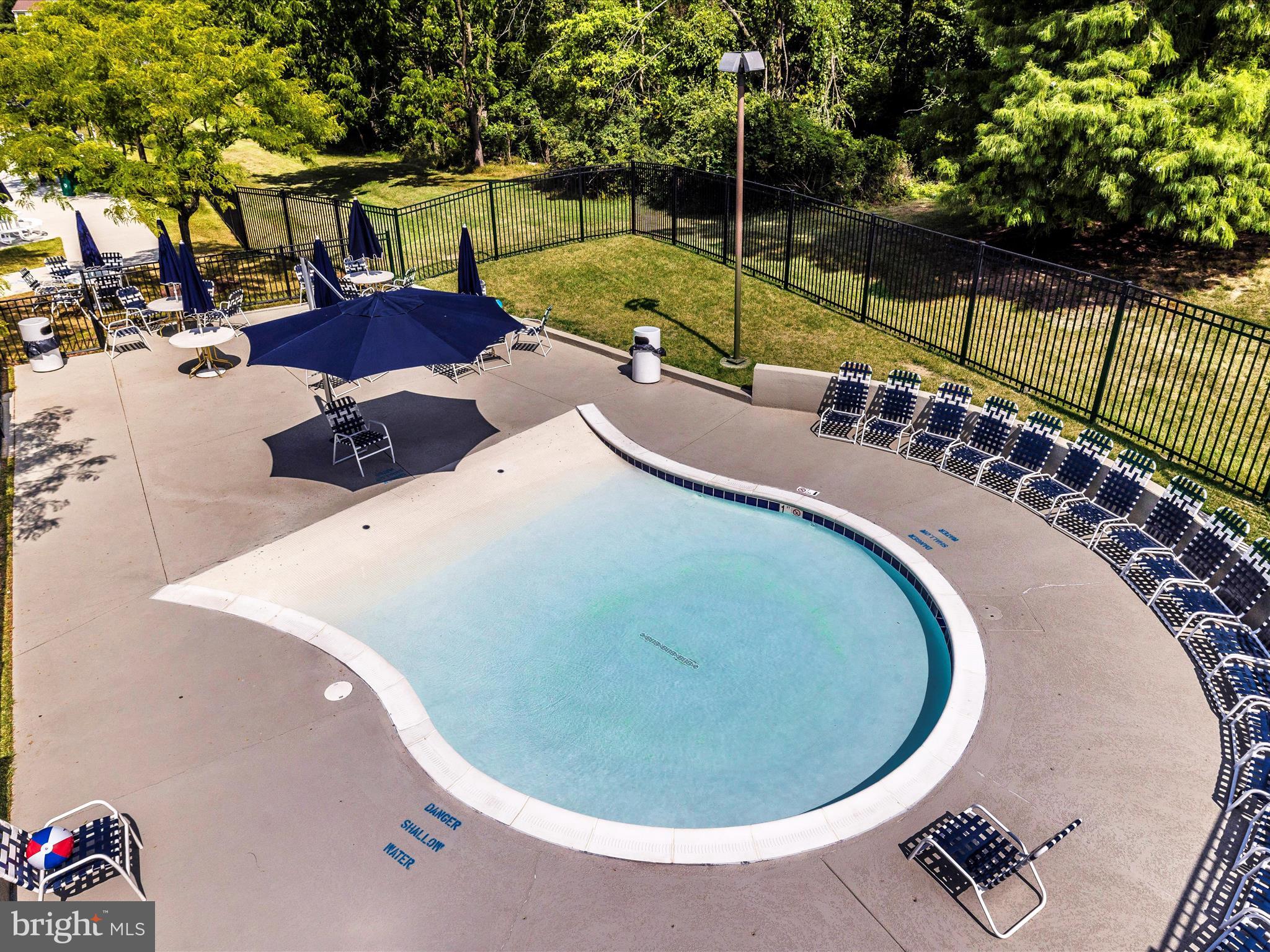 6509 Springwater Court, Unit 6303 Frederick, MD 21701 - Photo 38 of 48 an outdoor sitting area with furniture