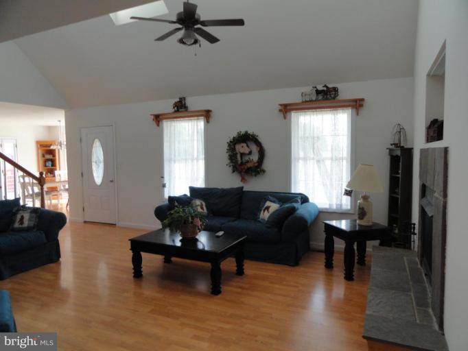 8235 Detour Road Denton, MD 21629 - Photo 11 of 30 a living room with furniture and a window