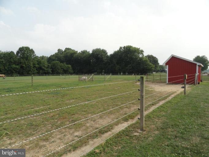 8235 Detour Road Denton, MD 21629 - Photo 25 of 30 a view of a tennis court
