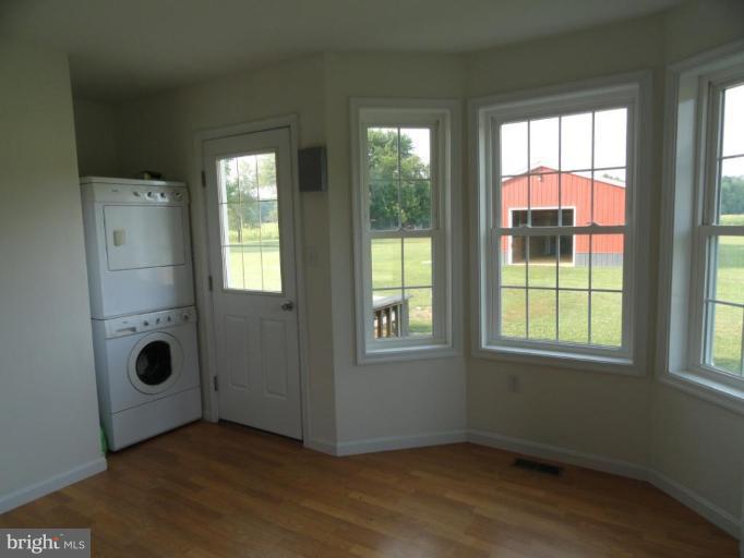 8235 Detour Road Denton, MD 21629 - Photo 4 of 30 an empty room with windows and closet