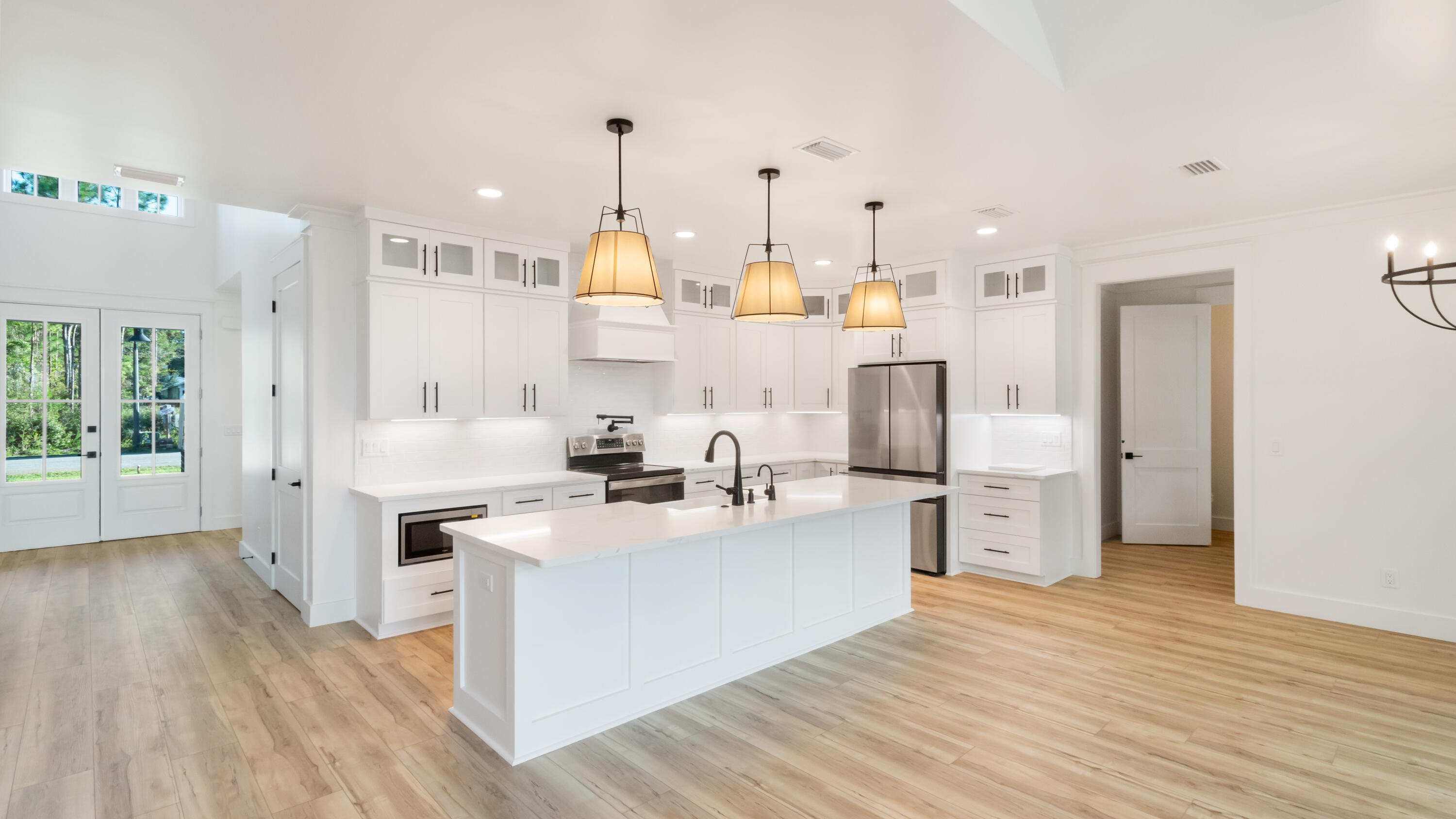 80 Muzzle Street Freeport, FL 32439 - Photo 2 of 71 a kitchen with stainless steel appliances granite countertop a sink stove and refrigerator