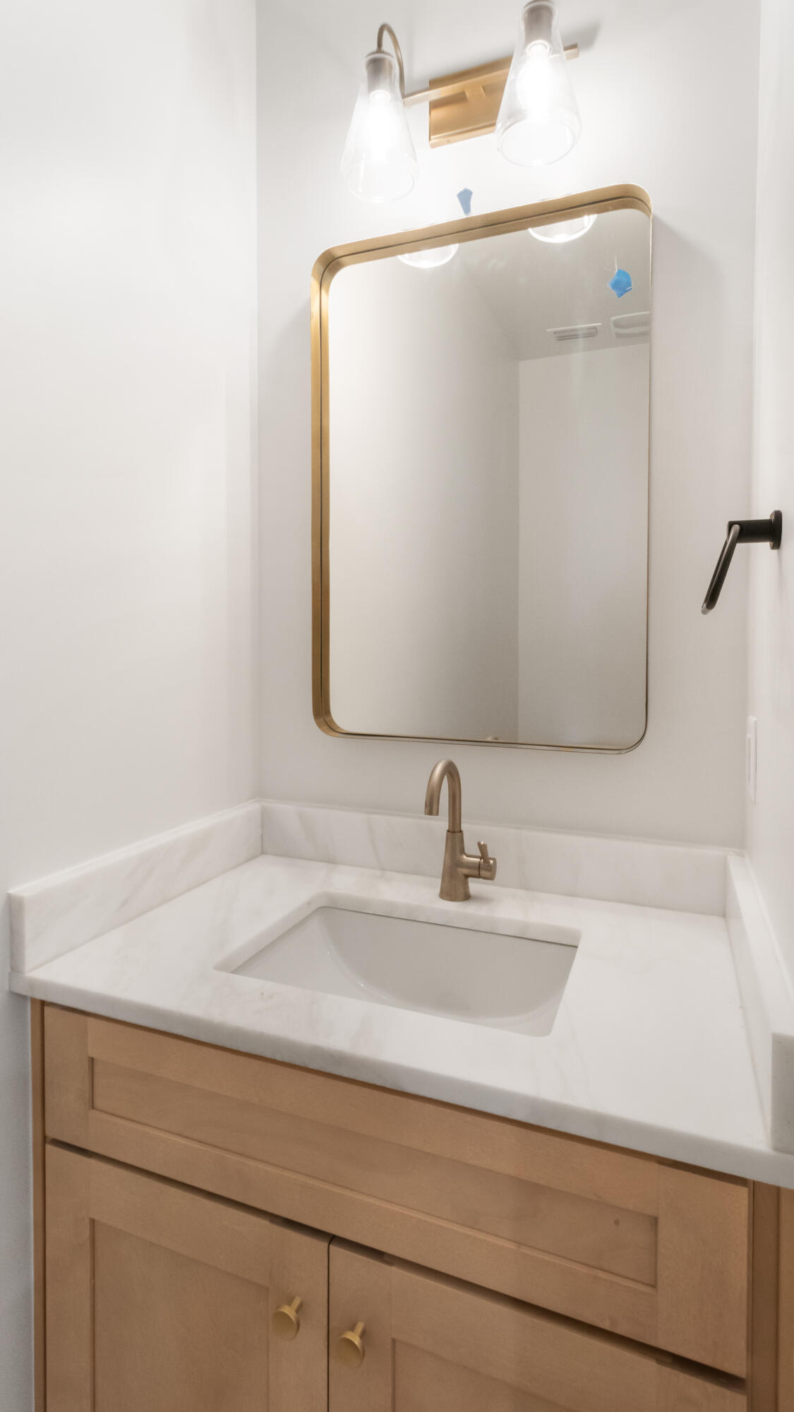 80 Muzzle Street Freeport, FL 32439 - Photo 20 of 71 a bathroom with a sink and a mirror